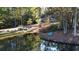 A tranquil pond, with a serene setting in the woods at 337 Andrew Bailey Rd, Sharpsburg, GA 30277