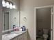 Bathroom featuring a granite vanity, and an open door to the toilet at 3566 Andover Way, Buford, GA 30519