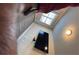 Modern bedroom with a large flat screen TV, window with blinds, and contemporary lighting at 3566 Andover Way, Buford, GA 30519