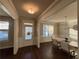 Inviting entryway featuring hardwood floors, elegant trim, and abundant natural light at 3566 Andover Way, Buford, GA 30519