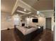 Comfortable living room with tray ceilings, fireplace, and a large sectional sofa at 3566 Andover Way, Buford, GA 30519