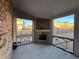 The screened-in porch has a fireplace and nice views at 3566 Andover Way, Buford, GA 30519