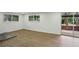 Basement with windows and sliding glass door that allows plenty of natural light to fill the room at 3567 Beachhill Dr, Atlanta, GA 30340