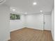 Basement area with window and access door providing practical utility at 3567 Beachhill Dr, Atlanta, GA 30340