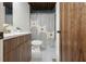 Bathroom featuring modern fixtures, patterned shower curtain, and mosaic tile floors at 3567 Beachhill Dr, Atlanta, GA 30340