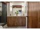 Bathroom with wood vanity, a glass shower, and modern fixtures at 3567 Beachhill Dr, Atlanta, GA 30340
