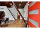 Inviting foyer with hardwood floors, staircase, vaulted wood ceilings, and modern lighting, creating a grand entrance at 3567 Beachhill Dr, Atlanta, GA 30340