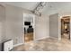 Basement with tile floors, access to other rooms, and a duct system overhead at 588 Peachtree Se Dr, White, GA 30184