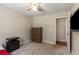 Bedroom featuring carpeted floors and a dresser at 588 Peachtree Se Dr, White, GA 30184