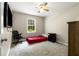 Bedroom featuring large windows and neutral carpeting at 588 Peachtree Se Dr, White, GA 30184