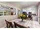 Dining area adjacent to kitchen, offering natural light and a seamless flow for entertaining at 588 Peachtree Se Dr, White, GA 30184