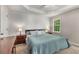 Main bedroom with a shiplap wall, carpet, and natural light at 588 Peachtree Se Dr, White, GA 30184