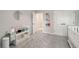 Baby Bedroom room with grey carpet, changing table and view of closet at 690 Cobblestone Creek Ln, Mableton, GA 30126