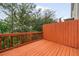 Exterior wooden deck and wooded view at 690 Cobblestone Creek Ln, Mableton, GA 30126