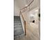 Entryway showcases a carpeted staircase, hardwood floors, and an open floor plan at 690 Cobblestone Creek Ln, Mableton, GA 30126