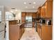 Traditional kitchen with stainless steel appliances, granite counters and ample cabinet space at 690 Cobblestone Creek Ln, Mableton, GA 30126