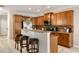 Traditional kitchen featuring granite counters, bar seating and stainless steel appliances at 690 Cobblestone Creek Ln, Mableton, GA 30126