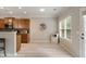 Bright kitchen area with eat-in space and stainless steel appliances adjacent to the breakfast nook at 690 Cobblestone Creek Ln, Mableton, GA 30126