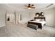 Expansive Primary bedroom with tray ceiling, large windows, and neutral color scheme at 690 Cobblestone Creek Ln, Mableton, GA 30126