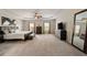 Spacious main bedroom with trey ceilings, carpeted floor and lots of natural light at 690 Cobblestone Creek Ln, Mableton, GA 30126