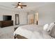 Beautifully-designed Primary bedroom featuring large windows, trey ceiling, and ample space at 690 Cobblestone Creek Ln, Mableton, GA 30126