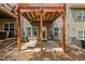 Outdoor patio space below a deck with access door at 690 Cobblestone Creek Ln, Mableton, GA 30126