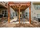 Private backyard patio offers a cool spot with its overhead deck and multiple A/C units for comfort at 690 Cobblestone Creek Ln, Mableton, GA 30126