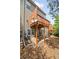 Spacious outdoor patio shaded by a deck, great for outdoor entertaining at 690 Cobblestone Creek Ln, Mableton, GA 30126