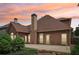 Back exterior showing the patio and part of the home; good for outdoor living and entertaining at 1545 Center Cross Pass, Marietta, GA 30062