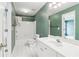 A full bathroom featuring tiled floors, a shower-tub combo, and a spacious vanity at 1545 Center Cross Pass, Marietta, GA 30062