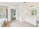 Spacious bathroom with a double vanity, glass shower, and adjacent bedroom at 1545 Center Cross Pass, Marietta, GA 30062