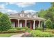 East Park Clubhouse with manicured gardens, brick facade, white columns, and ample landscaping at 1545 Center Cross Pass, Marietta, GA 30062