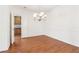 Dining room with hardwood floors and a decorative chandelier at 1545 Center Cross Pass, Marietta, GA 30062