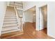 Bright foyer boasts hardwood floors, staircase, and open layout leading into other rooms at 1545 Center Cross Pass, Marietta, GA 30062
