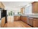 Open kitchen with stainless appliances, granite counters, and seamless flow to the living space at 1545 Center Cross Pass, Marietta, GA 30062