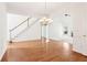 Open-concept living space featuring a staircase and ample natural light at 1545 Center Cross Pass, Marietta, GA 30062