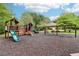 Community playground with slides and swings in a wooded area with picnic tables at 1545 Center Cross Pass, Marietta, GA 30062