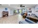 Finished basement with lots of living space, laminate floors, and modern decor at 1720 Alcovy River Dr, Dacula, GA 30019