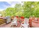 Relaxing deck with furniture for enjoying outdoors at 1720 Alcovy River Dr, Dacula, GA 30019
