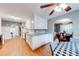 Bright kitchen featuring white cabinets, granite countertops, and stainless steel appliances at 1720 Alcovy River Dr, Dacula, GA 30019