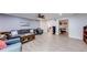 Spacious living room with laminate floors, neutral decor, and comfortable seating at 1720 Alcovy River Dr, Dacula, GA 30019