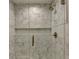 Modern bathroom featuring hexagon tile shower and glass door at 194 Jennifer Nw Ln, Lilburn, GA 30047