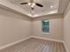 Bright bedroom featuring hardwood floors, a window, and recessed ceiling lights at 194 Jennifer Nw Ln, Lilburn, GA 30047