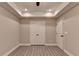 Bedroom featuring hardwood floors, recessed ceiling lights, and closet space at 194 Jennifer Nw Ln, Lilburn, GA 30047