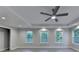 Spacious bedroom with ceiling fan and recessed lighting plus three windows at 194 Jennifer Nw Ln, Lilburn, GA 30047