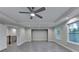 Open bonus room with three windows, recessed lighting, and vinyl floors at 194 Jennifer Nw Ln, Lilburn, GA 30047
