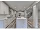 Open kitchen featuring a marble island, gas range, and stainless steel appliances at 194 Jennifer Nw Ln, Lilburn, GA 30047