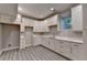 Modern kitchen featuring stainless steel appliances and bright white cabinetry at 194 Jennifer Nw Ln, Lilburn, GA 30047