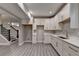 Modern kitchen featuring stainless steel appliances and bright white cabinetry at 194 Jennifer Nw Ln, Lilburn, GA 30047