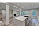 Open kitchen featuring a marble island, gas range, and stainless steel appliances at 194 Jennifer Nw Ln, Lilburn, GA 30047